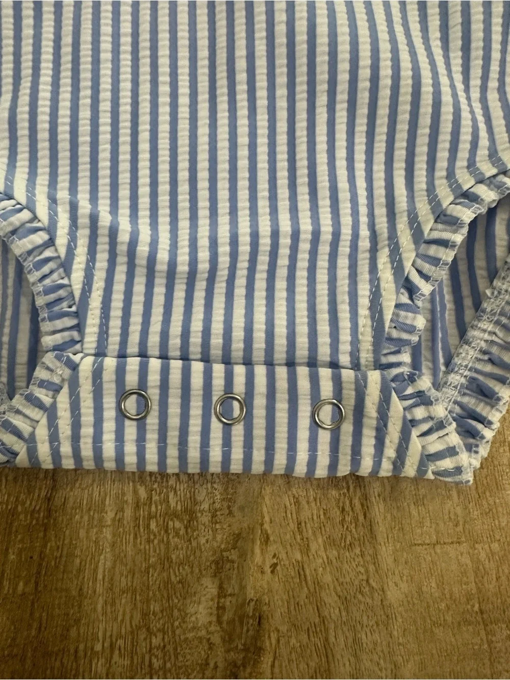 RuffleButts Blue Seersucker Rash Guard One Piece | 12–18M | UPF 50+